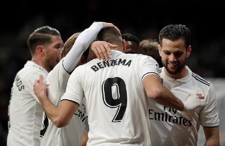 Karim Benzema of Real Madrid celebrates with his teammates after scoring a goal during La Liga soccer match between Real Madrid and Deportivo Alaves at Santiago Bernabeu Stadium in Madrid, Spain on February 3, 2019. PHOTO/GettyImages