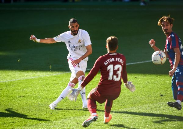 Karim Benzema of Real Madrid scores a goal during the Spanish championship La Liga football mach between Levante and Real Madrid on October 4, 2020 at Estadio de la Ceramica in Vila-real, Spain. PHOTO | AFP