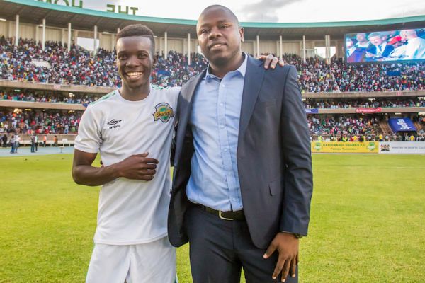 Kariobangi Sharks FC head coach, William Muluya (right) and his midfielder, Patillah Omotto pose after his team held Everton FC to a 1-1 draw before they won the subsequent shoot out 4-3 at the MISC Kasarani Stadium on Sunday, July 7, 2019. PHOTO/SPN