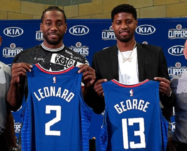 Kawhi Leonard and Paul George of the Los Angeles Clippers are introduced at Green Meadows Recreation Center on July 24, 2019 in Los Angeles, California. PHOTO/ GETTY IMAGES