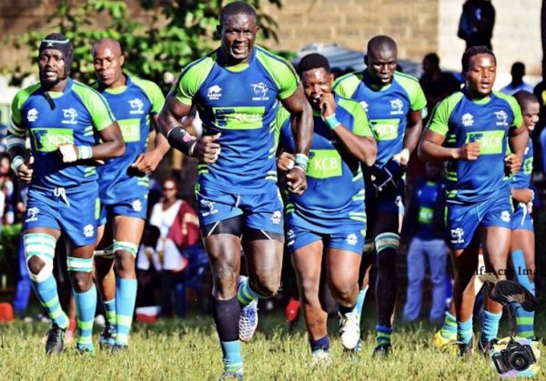 KCB RFC players led by the captain Andrew Amond (centre) race to the field. PHOTO/Courtesy