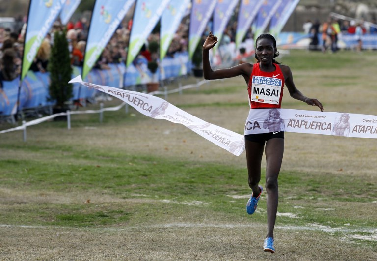 Kenian Linet Masai celebrates winning the women's Atapuerca Cross Race, near Burgos, northern Spain, on November 13, 2011. PHOTO/AFP