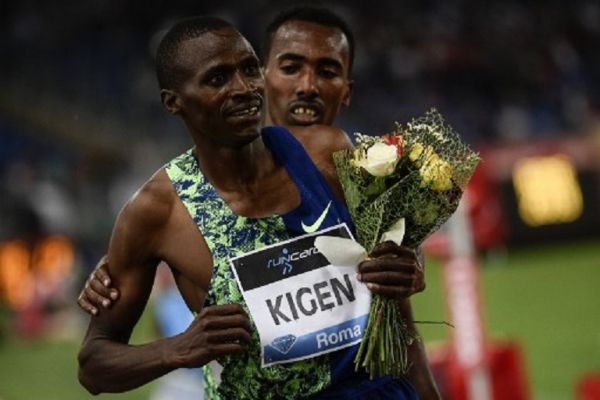 Kenya's Benjamin Kigen (L) is congratulated by Ethiopia's Getnet Wale after winning the Men's 3000m Steeplechase during the IAAF Diamond League competition on June 6, 2019 at the Olympic stadium in Rome. PHOTO/ AFP