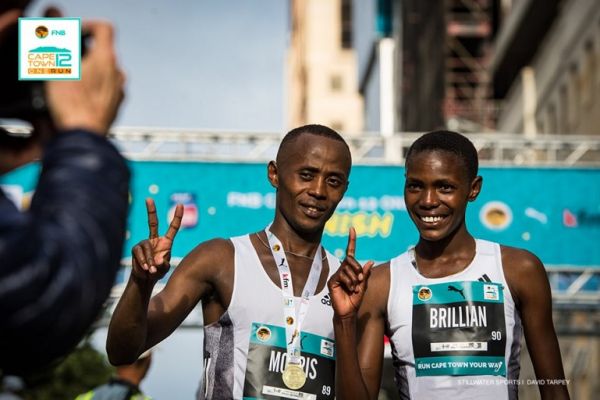 Kenya's Brilliant Kipkoech (right) and Morris Gechaga celebrate after sealing the women and men double during the 2019 FNB Cape Town 12 ONERUN in South Africa on Sunday, May 19, 2019. PHOTO/Courtesy/Organisers