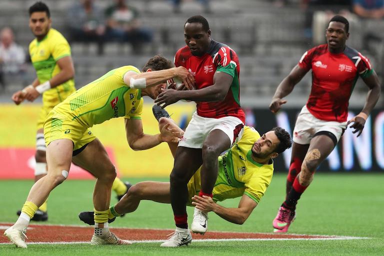 Kenya's Charles Omondi charges through the Australia defense on day two of the HSBC World Rugby Sevens Series in Vancouver on 10 March, 2019. PHOTO/Mike Lee/KLC fotos for World Rugby