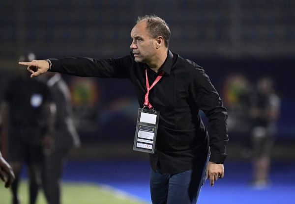 Kenya's coach Sebastian Migne gestures during the 2019 Africa Cup of Nations (CAN) football match between Kenya and Tanzania at the Stadium in Cairo on June 27, 2019. PHOTO/AFP