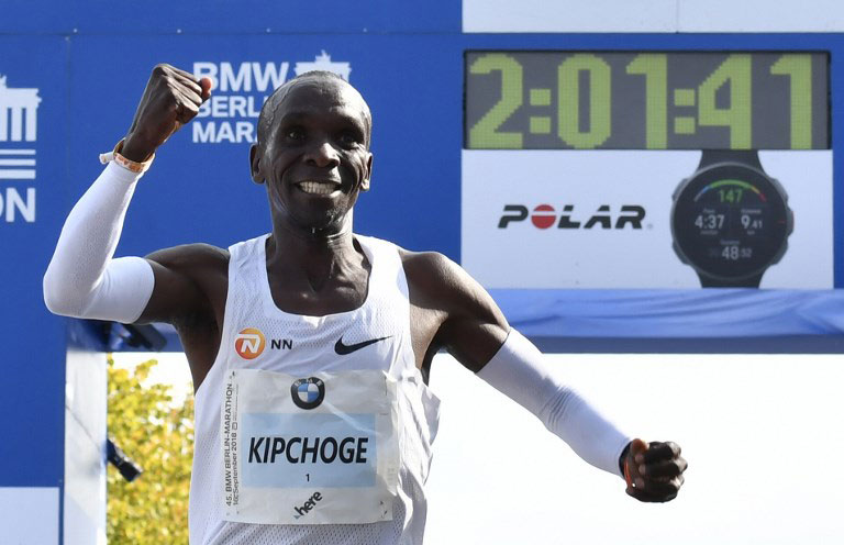 Kenya's Eliud Kipchoge celebrates winning the Berlin Marathon setting a new world record on September 16, 2018 in Berlin. PHOTO/AFP
