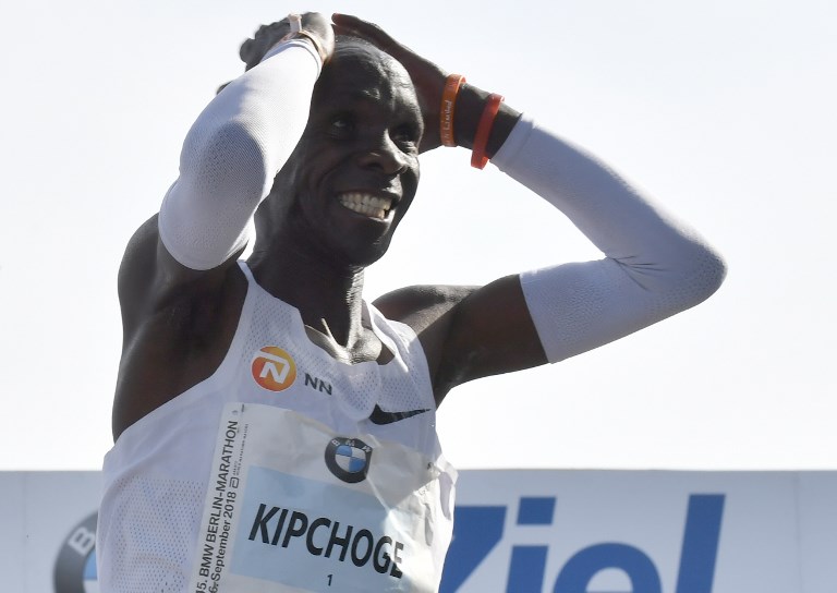 Kenya's Eliud Kipchoge reacts after winning the Berlin Marathon setting a new world record on September 16, 2018 in Berlin. PHOTO/AFP