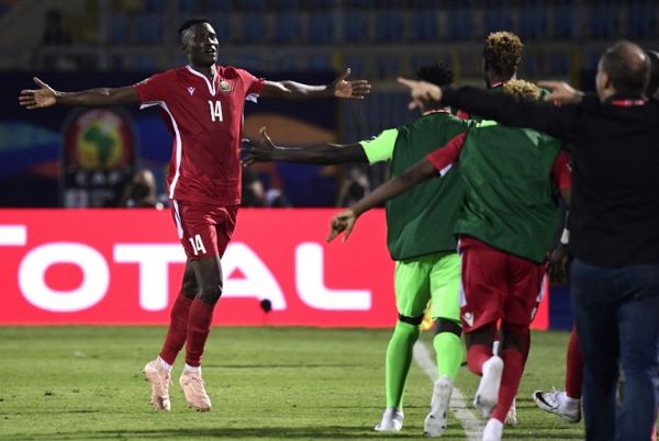 Kenya's forward Michael Olunga celebrates scoring his team's third goal during the 2019 Africa Cup of Nations (CAN) football match between Kenya and Tanzania at the Stadium in Cairo on June 27, 2019. PHOTO | AFP