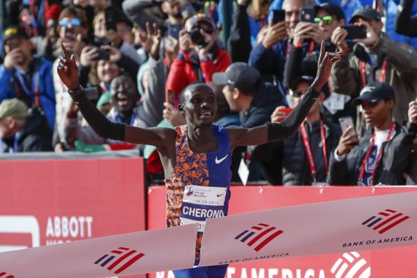 Kenya's Lawrence Cherono wins the men's 2019 Bank of America Chicago Marathon on October 13, 2019 in Chicago, Illinois. Kenya's Lawrence Cherono won a men's race that came down to the wire in 2:05:45 -- barely edging Ethiopia's Dejene Debela who was second in 2:05:46 with another Ethiopian, Asefa Mengstu, third in 2:05:48. Last year's winner Mo Farah of Britain was never a factor -- finishing a distant eighth in 2:09:58. PHOTO | AFP