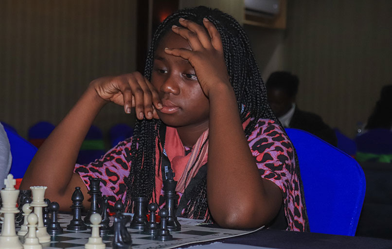 Kenya's Tracy Audrey ponders her next move during the ongoing Africa Youth Chess Championship in Kisumu. PHOTO/Courtesy