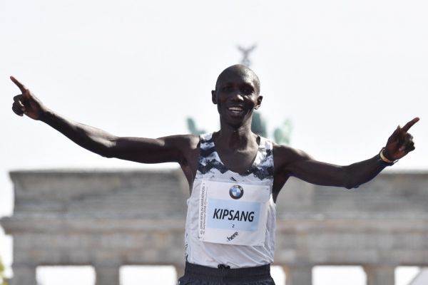 Kenya's Wilson Kipsang crosses the finish line to place third at the Berlin Marathon on September 16, 2018 in Berlin. PHOTO | AFP