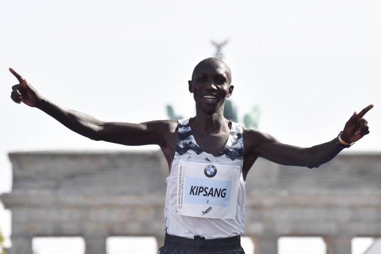 Kenya's Wilson Kipsang crosses the finish line to place third at the Berlin Marathon on September 16, 2018 in Berlin. PHOTO/AFP