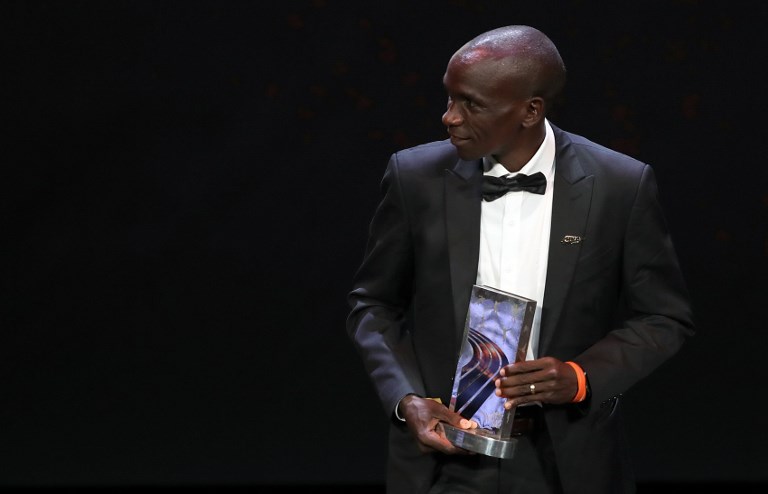 Kenyan athlete Eliud Kipchoge reacts after receing the Male athlete of the year award during the IAAF athlete of the year awards ceremony, on December 4, 2018 in Monaco. PHOTO/AFP