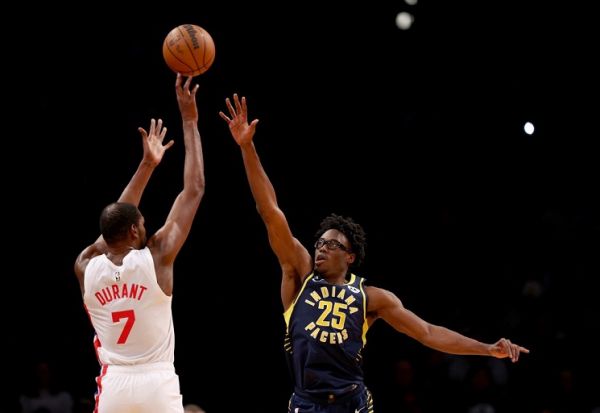 Kevin Durant #7 of the Brooklyn Nets takes a shot as Jalen Smith #25 of the Indiana Pacers defends in the second half at Barclays Center on October 29, 2022 in the Brooklyn borough of New York City. The Indiana Pacers defeated the Brooklyn Nets 125-116. PHOTO | AFP