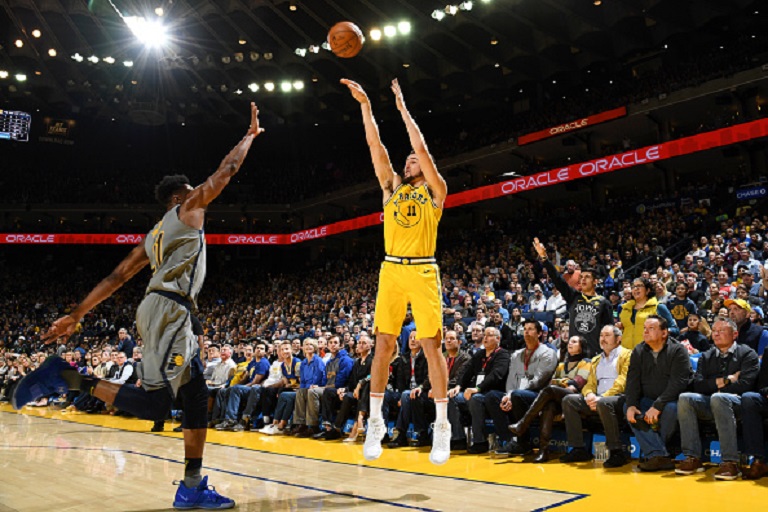 Klay Thompson #11 of the Golden State Warriors shoots a three point basket against the Indiana Pacers on March 21, 2019 at ORACLE Arena in Oakland, California. PHOTO/GettyImages