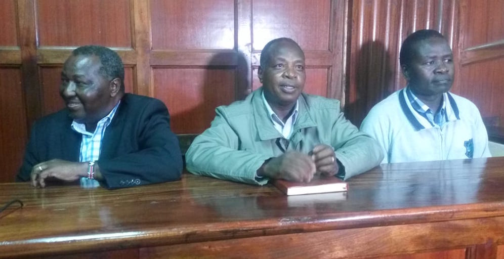 L to R: NOCK Secretary General, F K Paul, Rio 2016 Team Kenya Chef de Mission, Stephen Kiptanui arap Soi and Kenya Ambassador to Russia, Richard Ekai, when they appeared before the Anti Corruption court on Monday, October 15, 2018 to answer charges related to the Rio 2016 scandal. PHOTO/Courtesy
