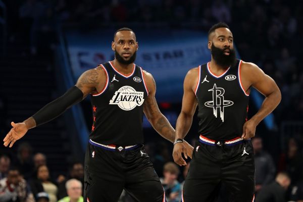 LeBron James #23 of the LA Lakers and James Harden #13 of the Houston Rockets both of Team LeBron look on as they play against Team Giannis in the first quarter during the NBA All-Star game as part of the 2019 NBA All-Star Weekend at Spectrum Center on February 17, 2019 in Charlotte, North Carolina. PHOTO | AFP