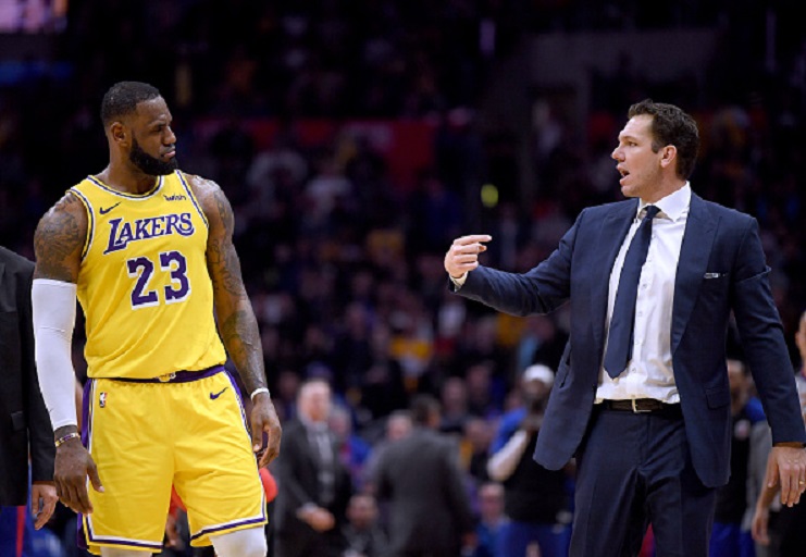 LeBron James #23 of the Los Angeles Lakers and Luke Walton talk during a timeout during a 123-120 win over the LA Clippers at Staples Center on January 31, 2019 in Los Angeles, California. PHOTO/GettyImages