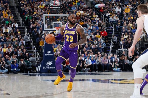 LeBron James #23 of the Los Angeles Lakers handles the ball against the Indiana Pacers in the first half of the game at Bankers Life Fieldhouse on February 5, 2019 in Indianapolis, Indiana. The Pacers won 136-94. PHOTO/GettyImages
