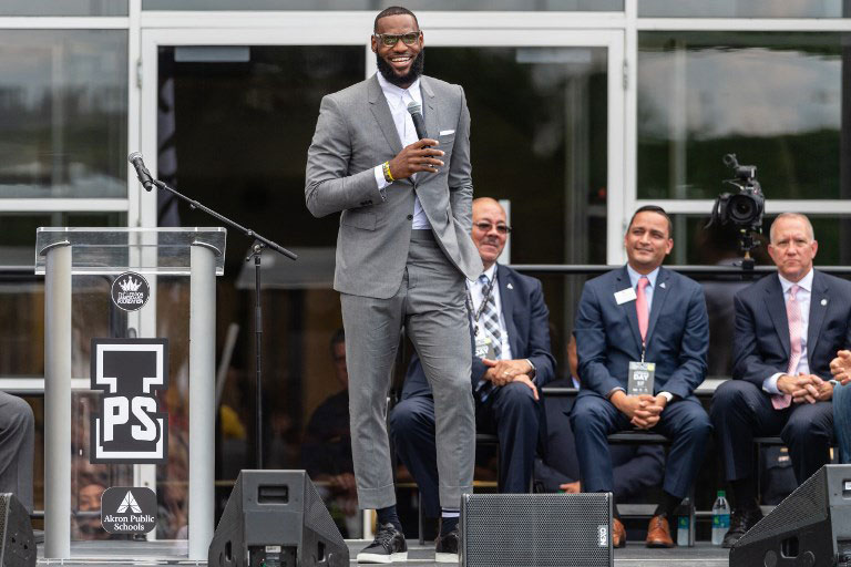 LeBron James addresses the crowd during the opening ceremonies of the I Promise School on July 30, 2018 in Akron, Ohio. PHOTO/AFP