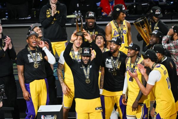 LeBron James lifts his MVP Award. PHOTO| AFP