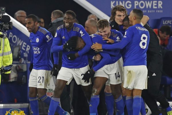 Leicester City's Nigerian striker Kelechi Iheanacho (C) celebrates with teammates after scoring their late winning goal during the English Premier League football match between Leicester City and Everton at King Power Stadium in Leicester, central England on December 1, 2019. Leicester won the game 2-1. PHOTO | AFP