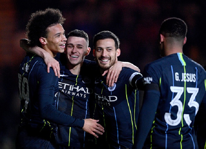 Leroy Sane of Manchester City celebrates with teammates after scoring his team's first goal during the FA Cup Fifth Round match between Newport County AFC and Manchester City at Rodney Parade on February 16, 2019 in Newport, United Kingdom. PHOTO/GettyImages