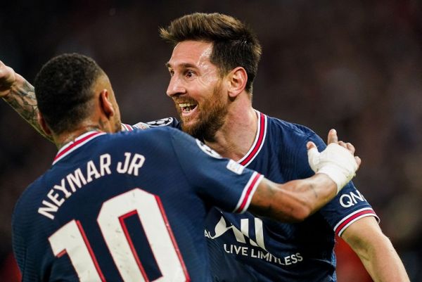 Lionel Messi of Paris Saint-Germain celebrates after scoring his sides second goal with Neymar of Paris Saint-Germain during the Champions League match between Paris Saint-Germain and Manchester City FC at Parc des Princes on September 28, 2021 in Paris, France. PHOTO | AFP