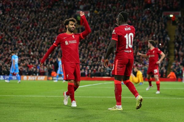 Liverpool forwards Mohamed Salah and Sadio Mane celebrate after the latter scored against Atletico Madrid. PHOTO | ChampionsLeagueTwitter