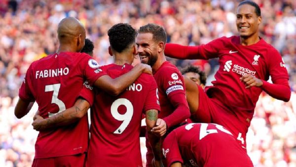Liverpool's Colombian midfielder Luis Diaz (C) celebrates with teammates after scoring their first goal during the English Premier League football match between Liverpool and Bournemouth at Anfield in Liverpool, north west England on August 27, 2022. PHOTO | AFP