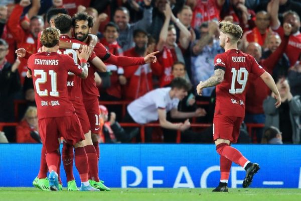 Liverpool's Egyptian striker Mohamed Salah (3th L) celebrates scoring his team's first goal with teammates during the UEFA Champions League group A football match between Liverpool and Ajax at Anfield in Liverpool, north west England on September 13, 2022. PHOTO | AFP