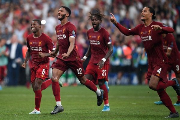 Liverpool's players celebrate winning the UEFA Super Cup 2019 football match between FC Liverpool and FC Chelsea at Besiktas Park Stadium in Istanbul on August 14, 2019. PHOTO | AFP