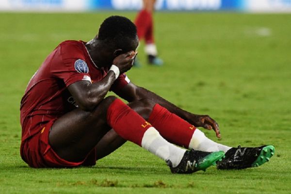 Liverpool's senegalese striker Sadio Mane reacts at the end of the UEFA Champions League Group E football match SSC Napoli vs Liverpool FC on September 17 2019 at the San Paolo Stadium. SSC Napoli won 2-0. PHOTO/ GETTY IMAGES