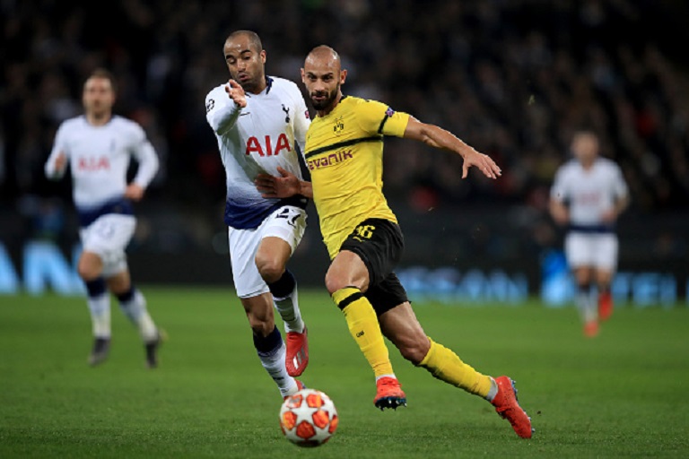 Lucas of Tottenham Hotspur in action with Omer Toprak of Dortmund during the UEFA Champions League Round of 16 First Leg match between Tottenham Hotspur and Borussia Dortmund at Wembley Stadium on February 13, 2019 in London, England.