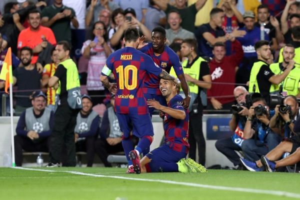 Luis Suarez of FC Barcelona celebrates with Lionel Messi and Ousmane Dembele after scoring the winning goal during the UEFA Champions League, Group F football match between FC Barcelona and FC Internazionale on October 2, 2019 at Camp Nou stadium in Barcelona, Spain. PHOTO | AFP