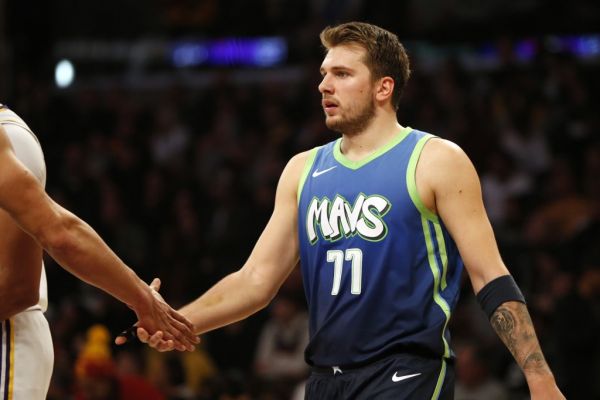 Luka Doncic #77 of the Dallas Mavericks looks on during the second half against the Los Angeles Lakers at Staples Center on December 01, 2019 in Los Angeles, California. PHOTO | AFP