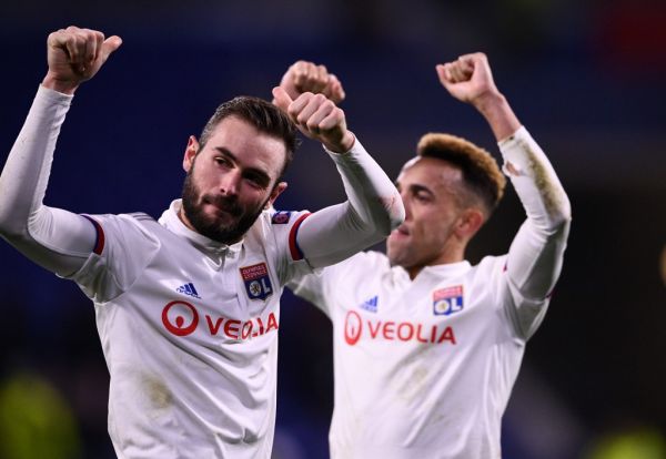 Lyon's French midfielder Lucas Tousart (L) celebrates at the end of the UEFA Champions League round of 16 first-leg football match between Lyon and Juventus at the Parc Olympique Lyonnais stadium in Decines-Charpieu, central-eastern France, on February 26, 2020. PHOTO | AFP