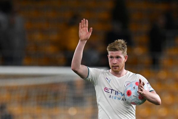 Manchester City's Belgian midfielder Kevin De Bruyne waves to fans at the end of the English Premier League football match between Wolverhampton Wanderers and Manchester City at the Molineux stadium in Wolverhampton, central England on May 11, 2022. PHOTO | AFP