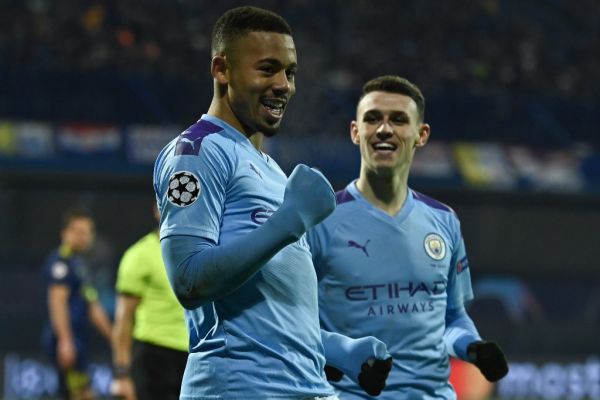 Manchester City's Brazilian striker Gabriel Jesus (L) celebrates after scoring a goal during the UEFA Champions League Group C football match between GNK Dinamo Zagreb and Manchester City FC at the Maksimir Stadium in Zagreb on December 11, 2019. PHOTO | AFP