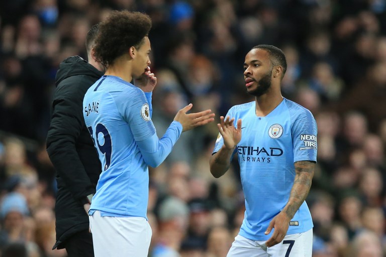 Manchester City's English midfielder Raheem Sterling (R) is substituted by Manchester City's German midfielder Leroy Sane during the English Premier League football match between Manchester City and Watford at the Etihad Stadium in Manchester, north west England, on March 9, 2019. PHOTO/AFP