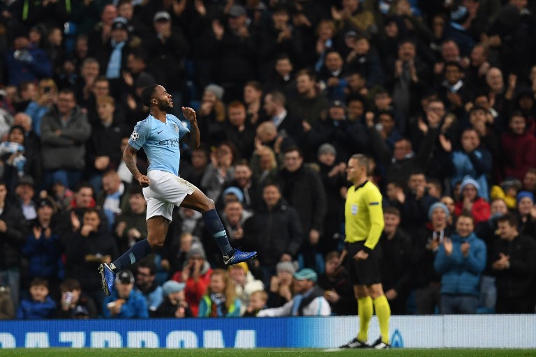 Manchester City's English midfielder Raheem Sterling celebrates after scoring their third goal during a UEFA Champions League group F football match between Manchester City and Shakhtar Donetsk at the Etihad stadium in Manchester, northwest England on November 7, 2018.PHOTO/ AFP