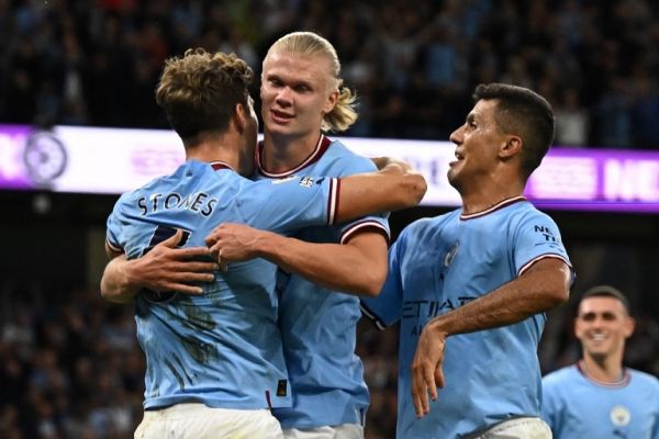 Manchester City's Norwegian striker Erling Haaland (C) celebrates with teammates after scoring the team's third goal during the English Premier League football match between Manchester City and Nottingham Forest at the Etihad Stadium in Manchester, north west England, on August 31, 2022. PHOTO | AFP
