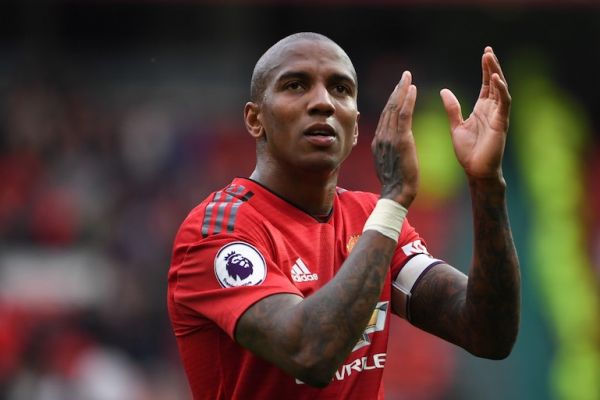 Manchester United's English defender Ashley Young applauds the fans at the end of the English Premier League football match between Manchester United and Chelsea at Old Trafford in Manchester, north west England, on April 28, 2019. PHOTO/AFP