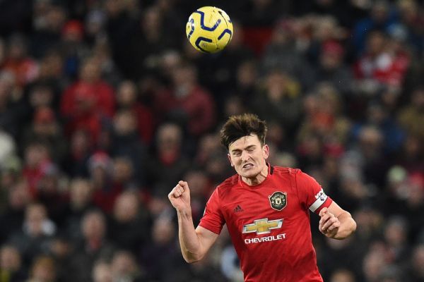 Manchester United's English defender Harry Maguire heads the ball during the English Premier League football match between Manchester United and Aston Villa at Old Trafford in Manchester, north west England, on December 1, 2019. PHOTO | AFP