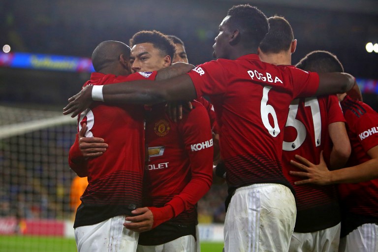 Manchester United's English midfielder Jesse Lingard (2nd L) celebrates with teammates after scoring their fourth goal from the penalty spot during the English Premier League football match between between Cardiff City and Manchester United at Cardiff City Stadium in Cardiff, south Wales on December 22, 2018. PHOTO/AFP