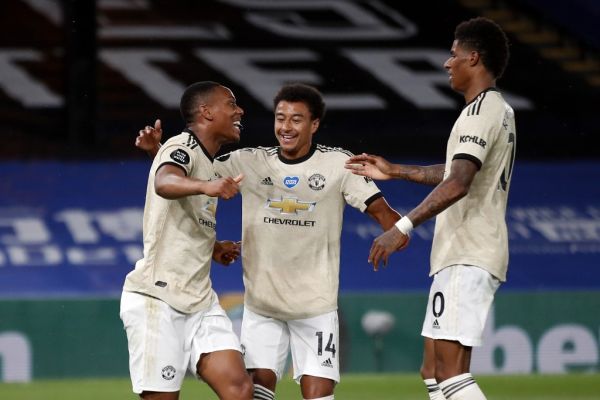 Manchester United's French striker Anthony Martial (L) celebrates with teammates after scoring their second goal during the English Premier League football match between Crystal Palace and Manchester United at Selhurst Park in south London on July 16, 2020. PHOTO | AFP