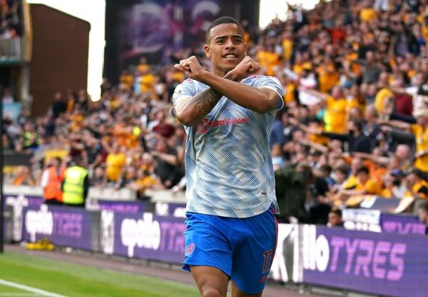 Manchester United's Mason Greenwood celebrates scoring their side's first goal of the game during the Premier League match at Molineux Stadium, Wolverhampton.