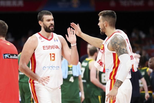 Marc Gasol (L) of Spain claps hands with his teammate during the semifinal match between Spain and Australia at the 2019 FIBA World Cup in Beijing, capital of China, Sept. 13, 2019. PHOTO | AFP