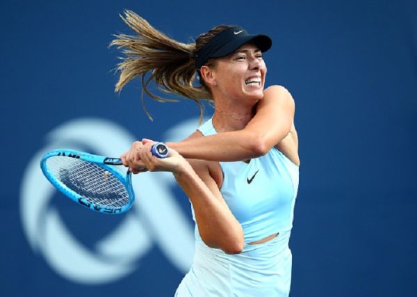 Maria Sharapova of Russia hits a shot against Anett Kontaveit of Estonia during a first round match on Day 3 of the Rogers Cup at Aviva Centre on August 05, 2019 in Toronto, Canada.PHOTO/ GETTY IMAGES